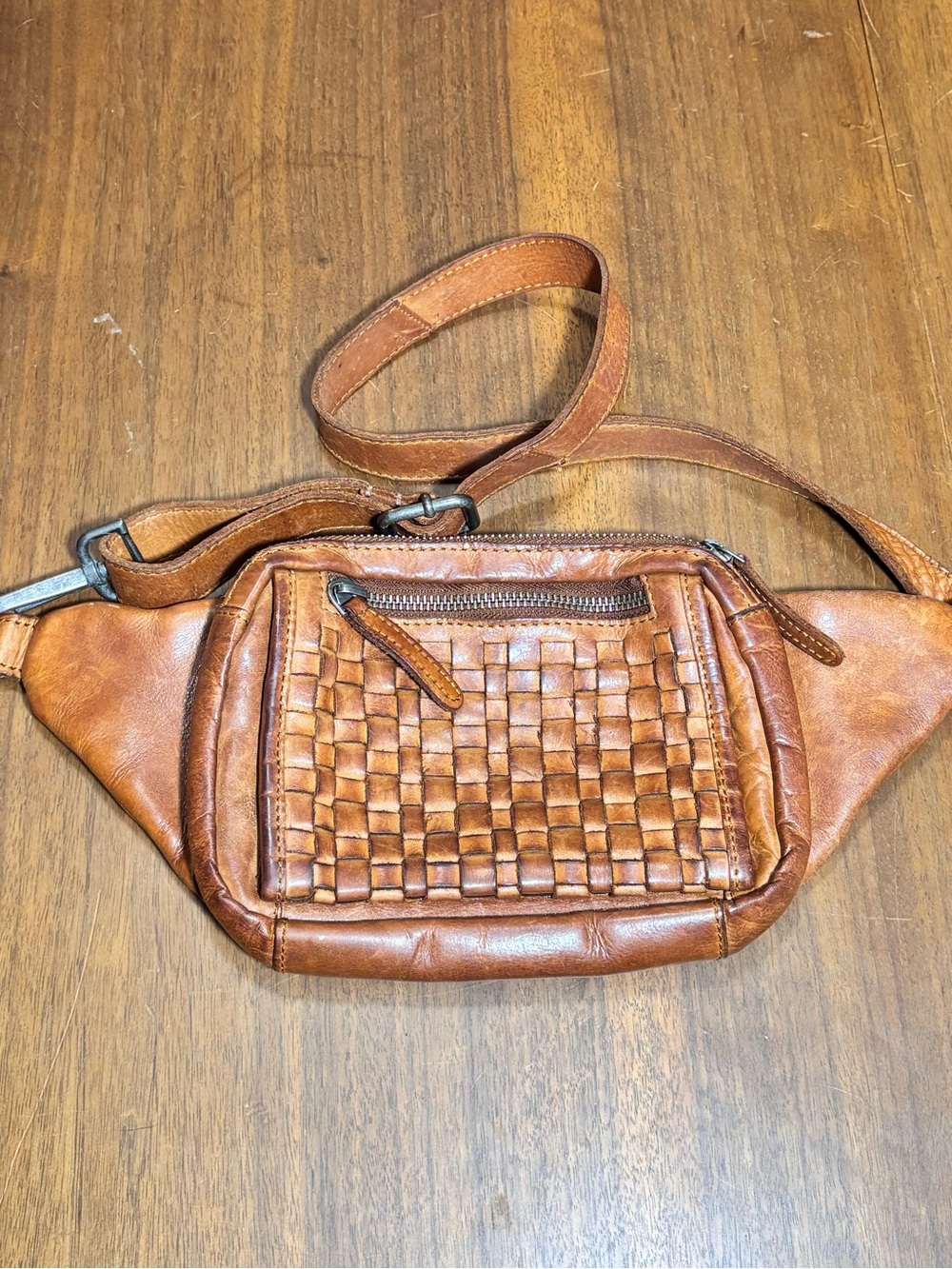 Vilenca Holland woven leather belt bag in Cognac Brown, adjustable